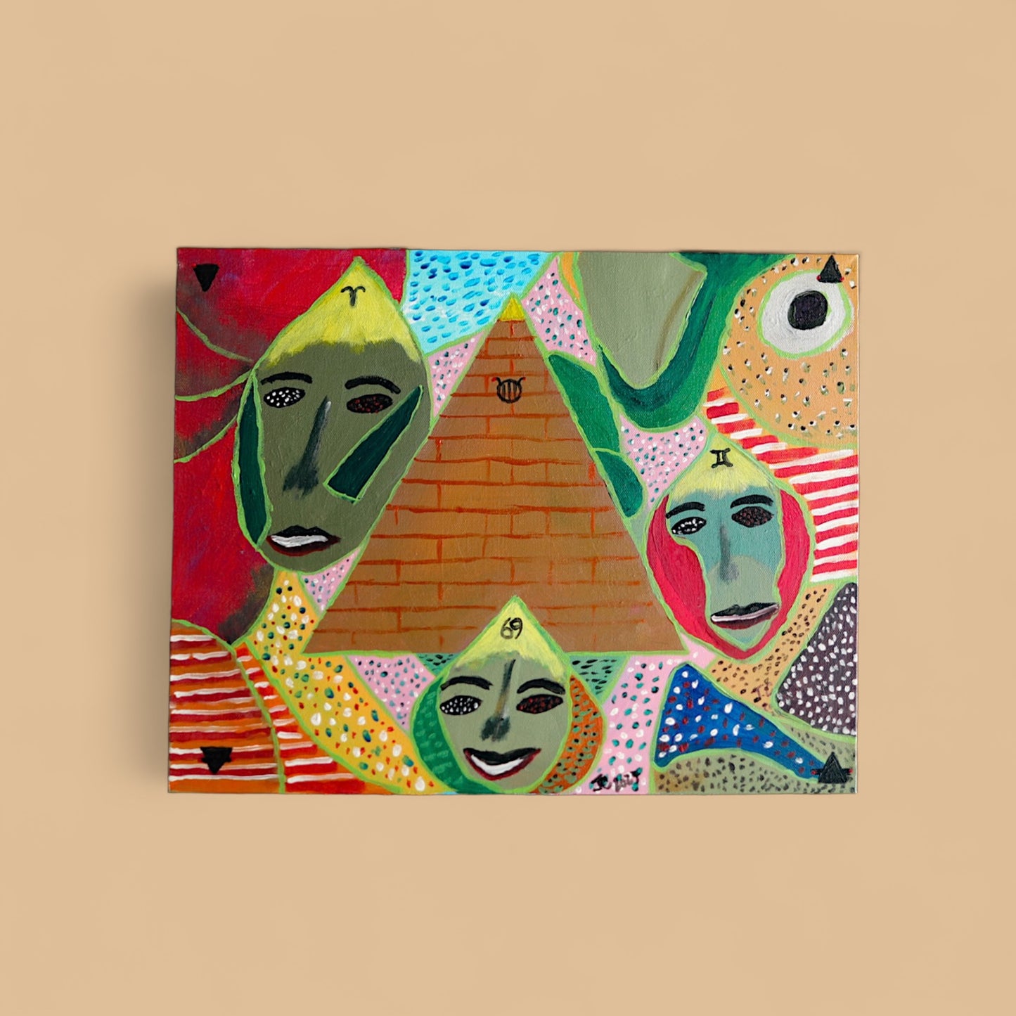 Four Faces and A Pyramid